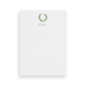 laurel wreath classic notepad printed on White paper.