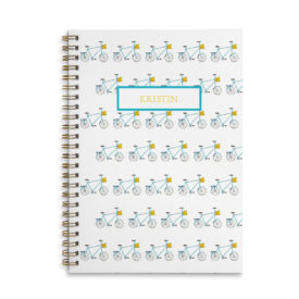 Personalized spiral bound notebook with a bike image.