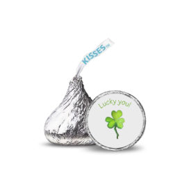 green shamrock image printed on small candy sticker that fits on a Hershey's kiss.